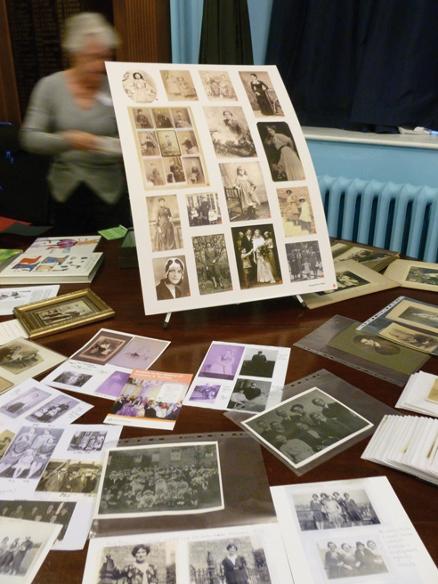 Family photos table at the 'Ordinary People' study day in 2012.: 